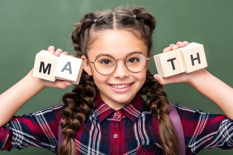 portrait-of-schoolchild-holding-.jpeg